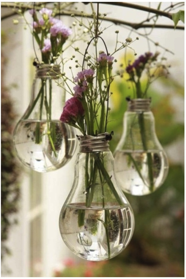 Recycled lightbulb vases with flowers