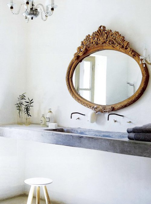 gorgeous bathroom with mirror and concrete countertop 