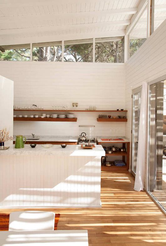 Love the clerestory windows, the spaciousness and natural wood floors in this Palm Springs Kitchen via sfgirlbybay